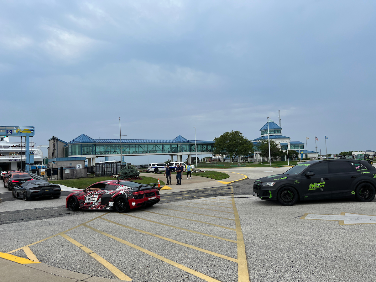 Sports cars loading on Ferry