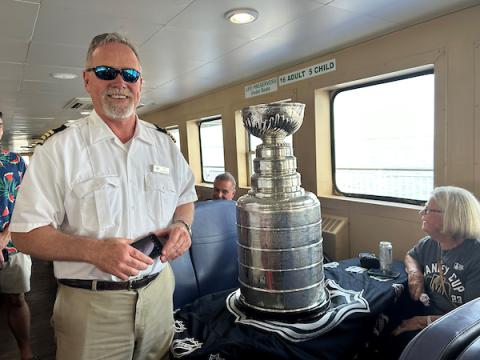 Captian Harkin pictured with the cup