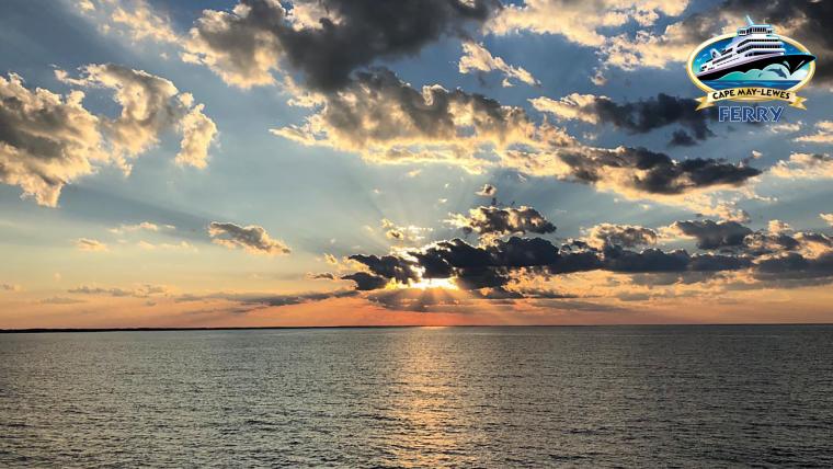 The sun sets over the Delaware Bay, as seen from the Cape May-Lewes Ferry