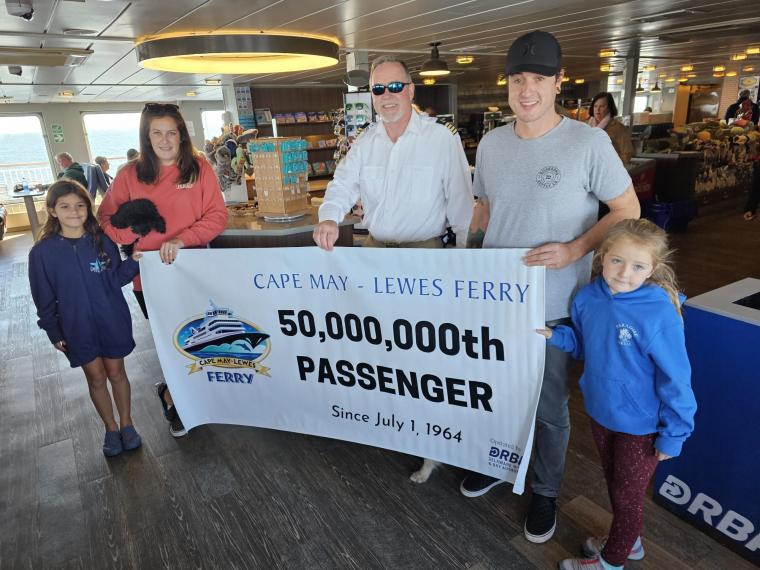 Celebration of the 50,000,000th Passenger Zach Kaltenbach with Jody, Finley and Harbor