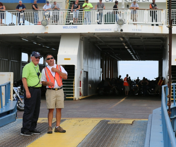 Ferry employees working to board the vessel