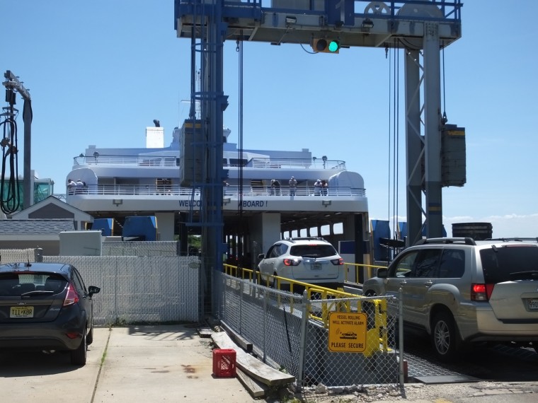 cars driving on to the Cape May-Lewes Ferry