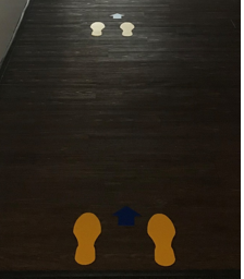 feet decals on the floor of the Ferry salon