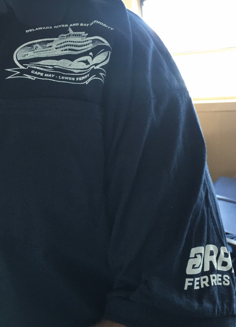close up of logos on a marine crew shirt 2020