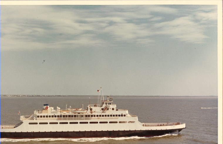 An archive photo of the Cape May-Lewes Ferry sailing mid-twentieth century with the original red D stack logo.