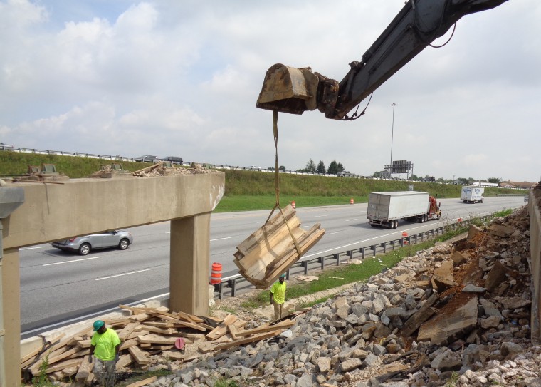 DRBA crews remove an old ramp on I-295