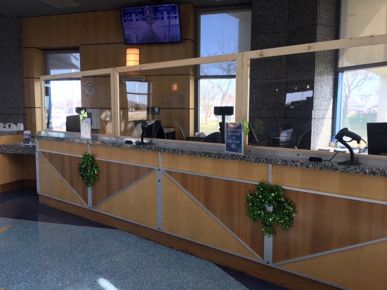 sneeze guard shield on terminal ticket counters