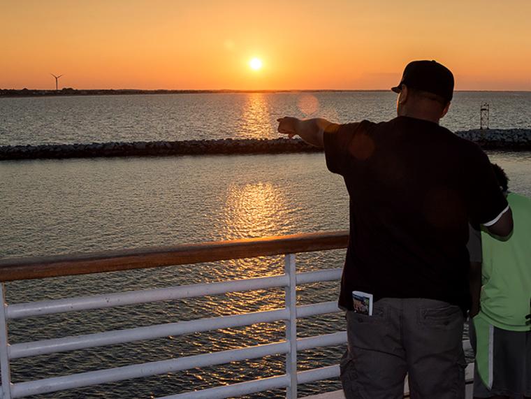 A family enjoys the view aboard the Cape May-Lewes Ferry