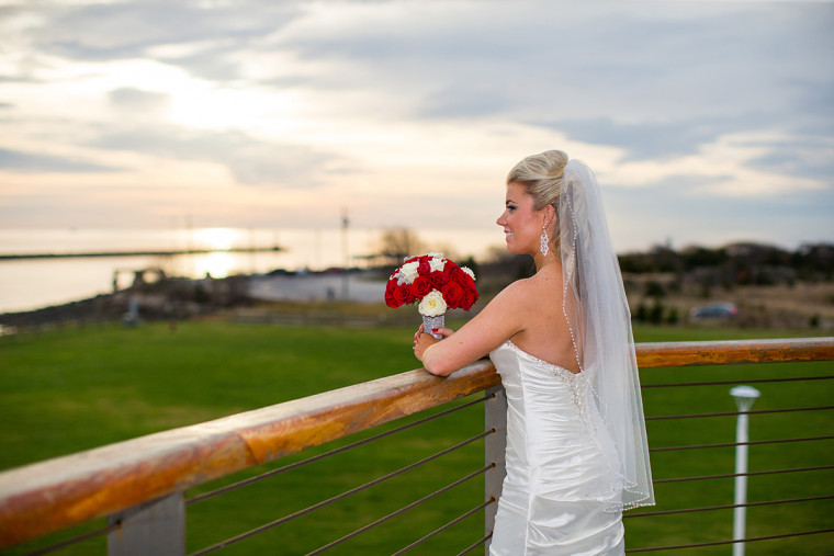 Bride looking over the balcony from the Sunset Lounge at the Cape May Lewes Ferry