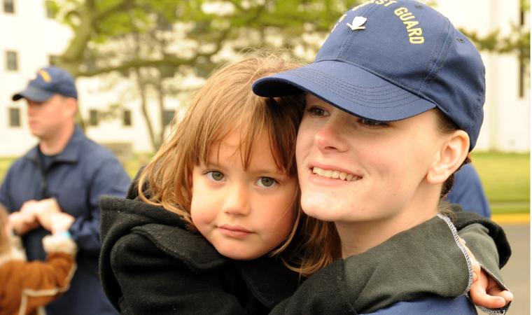 Parent carrying child