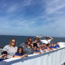 Group looking off the side of the ferry