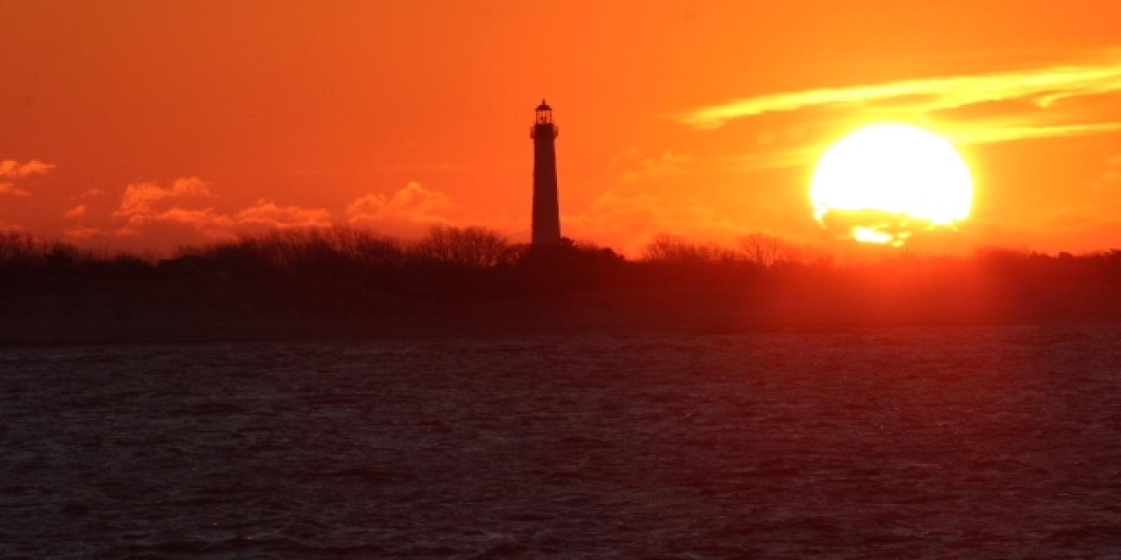 Sunrise by the Cape May Lighthouse as seen on the Cape May-Lewes Ferry