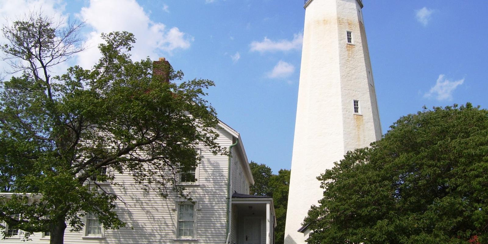 A ground level view of the light house in Sandy Hook, NJ