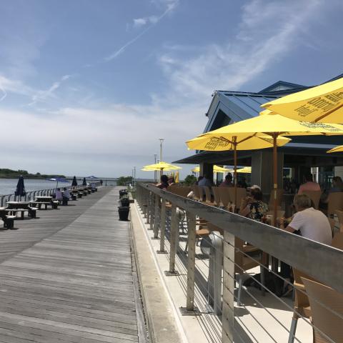 Diners at On The Rocks in Cape May take in the view of the Delaware Bay