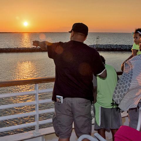 A family enjoys the view aboard the Cape May-Lewes Ferry