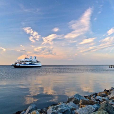 Ferry in the bay at sunset