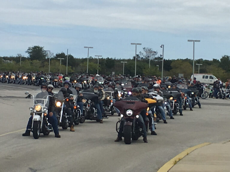 Motorcycles line up with their rides in two rows to board the Cape May - Lewes Ferry in Cape May. Hundreds of Bikes are in the photo.