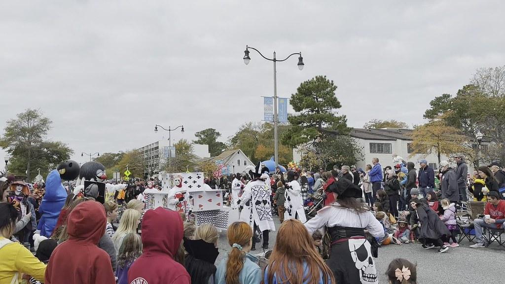 Festivities of the Sea Witch festival. a group of people dressed up like a card deck