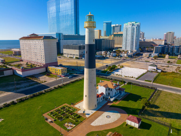 Absecon Lighthouse aerial view at the mouth of Absecon Inlet in the north end of Atlantic City, New Jersey, USA. The lighthouse was built in 1856 and is the tallest Lighthouse in New Jersey.
