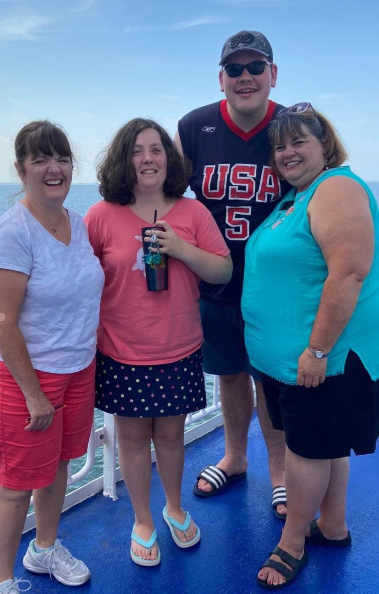 Image from Carlson-Muldowney party, four people posing