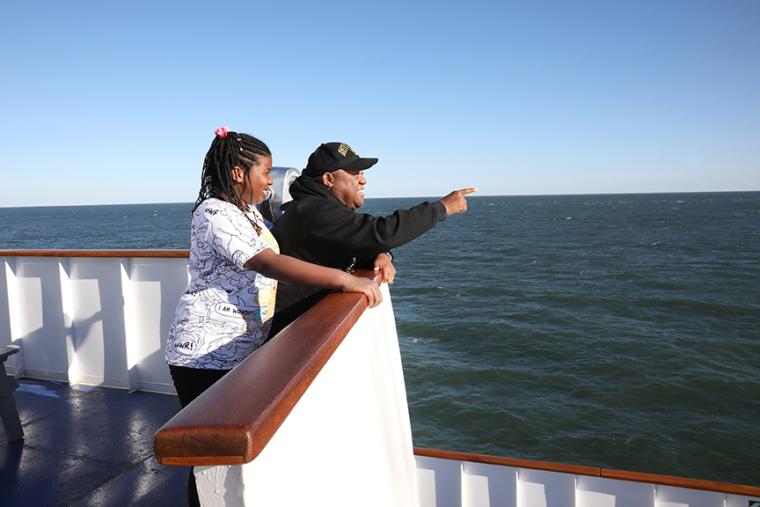 A family enjoying the Bay views from the upper deck of the Cape May-Lewes Ferry