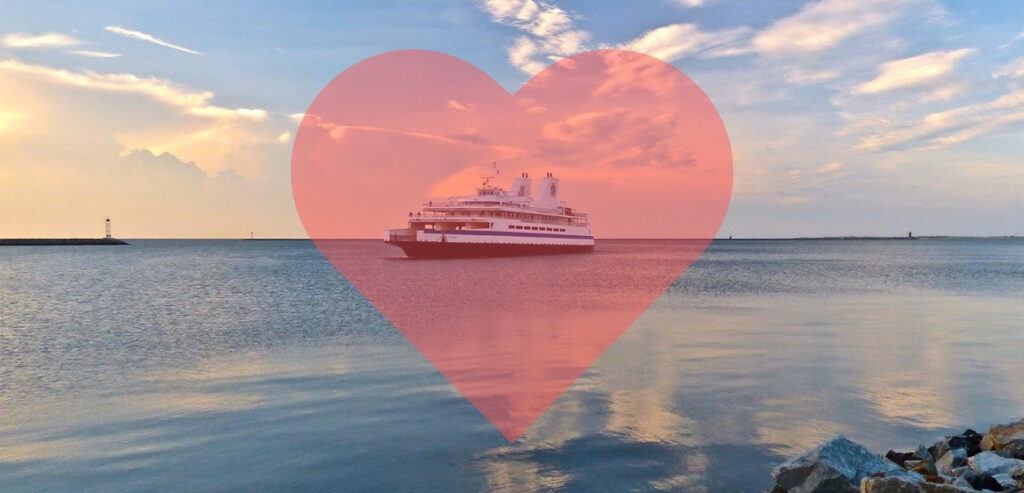 Red heart graphic placed over the ferry