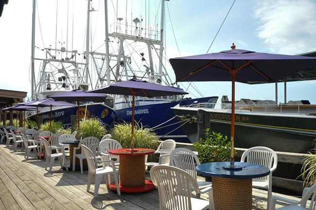 Outdoor seating on the waterfront at The Lobster House, located in Cape May