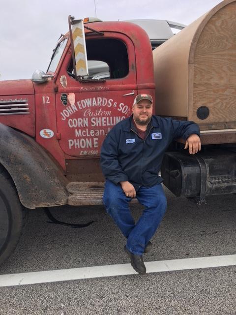 Mark McBride sits on his truck