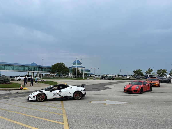 Sports cars driving on the boat