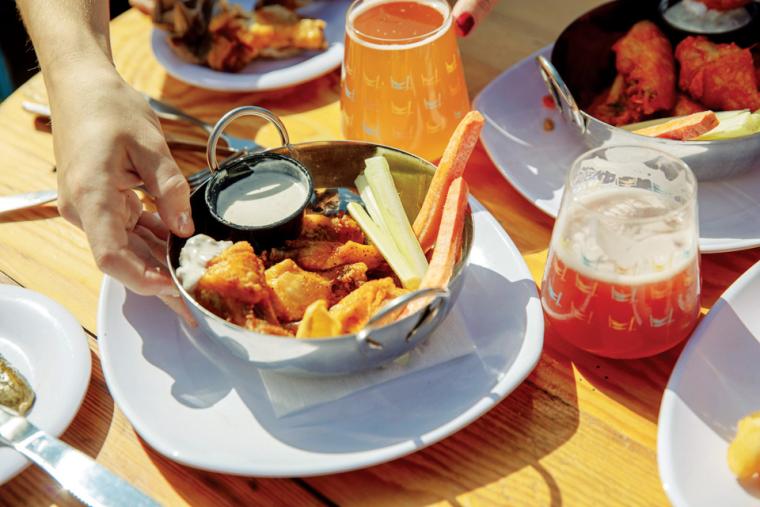 Outdoor dining at Crooked Hammock Brewery