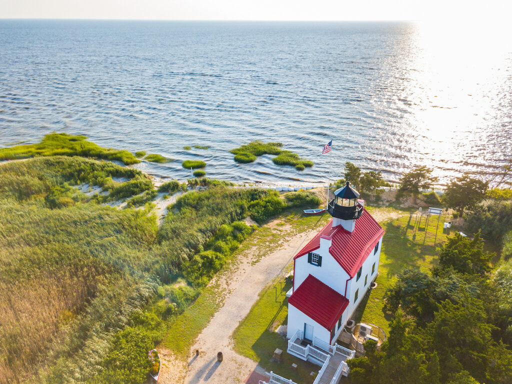 A view of the Cape May East Point Lighthouse on the Maurice River from the air