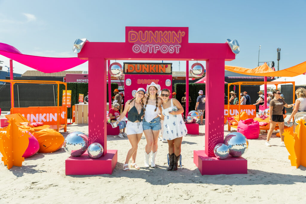 Fans have fun at the Dunkin Outpost at Barefoot Country Music Festival