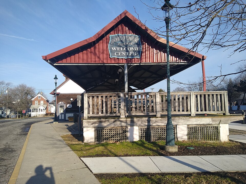 Cape May Welcome Center at 609 Lafayette Street in Cape May, NJ, where cyclists and visitors can pick up local maps, bike-friendly route guides, and current event listings before exploring the area. Photo by WhisperToMe (https://commons.wikimedia.org/wiki/File:Cape_May_City_Tourist_center_and_transportation_station.jpg) , CC0, via Wikimedia Commons