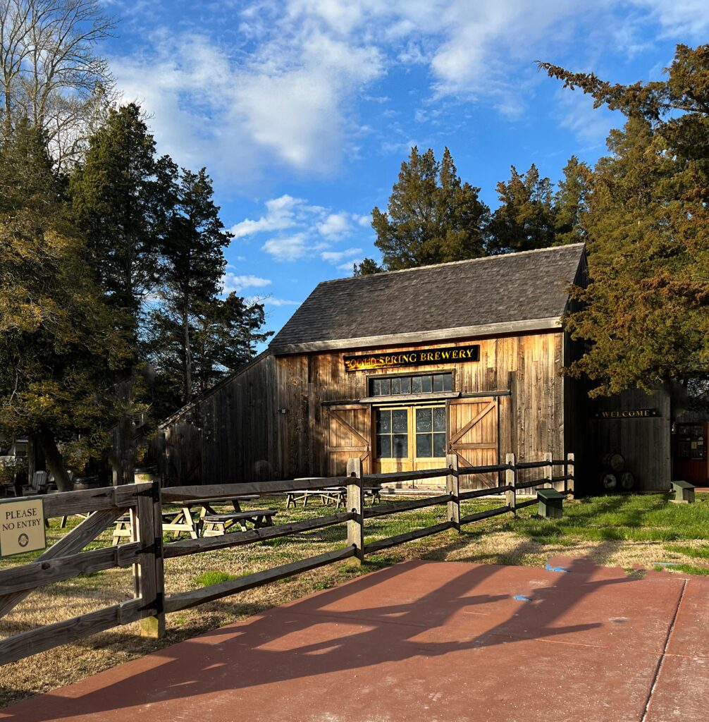 photos of the front of the Cold Spring Brewery with the sun shining on the front of the building