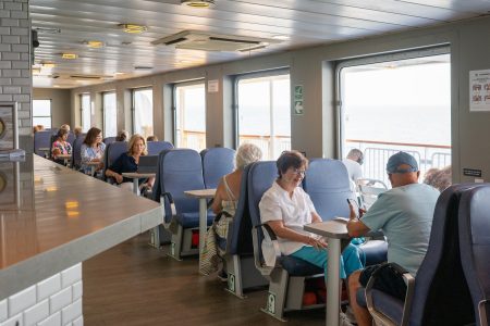 Passengers relax in the Salon while sailing to Lewes DE from Cape May on the Cape May - Lewes Ferry MV New Jersey