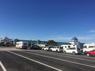 RVs, Campers, Trailers and cars wait to drive onto the Cape May - Lewes Ferry in Cape May NJ