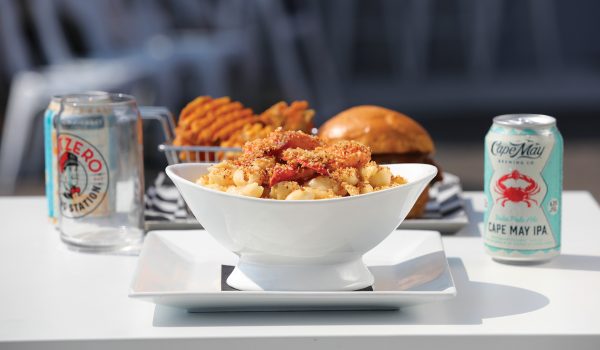 Lunch menu items on outdoor table accompanied by the popular Cape May Brewing Co. IPAs