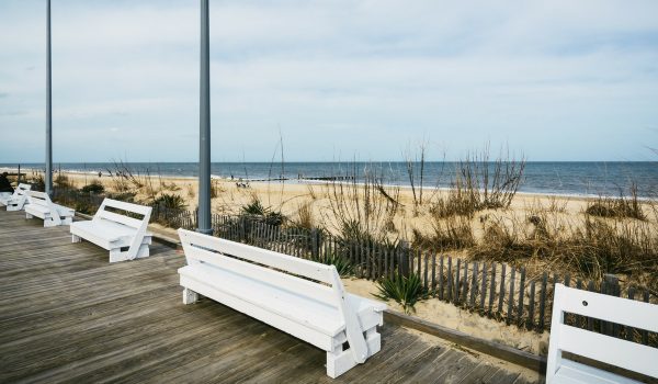 Benches face the ocean on Rehoboth Beach Boardwalk